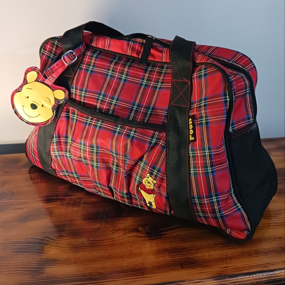 Disney’s Winnie The Pooh Lg Overnight Tote/ Carry-on with travel tag.